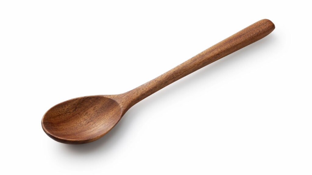 Por que colocar uma colher de pau sobre a panela evita que a água derrame?