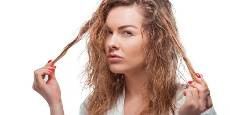 Gesto de mexer no cabelo