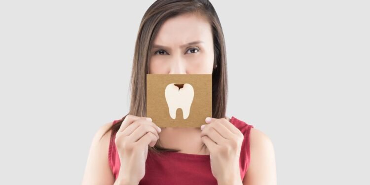 Cáries - Créditos: depositphotos.com / Tharakorn