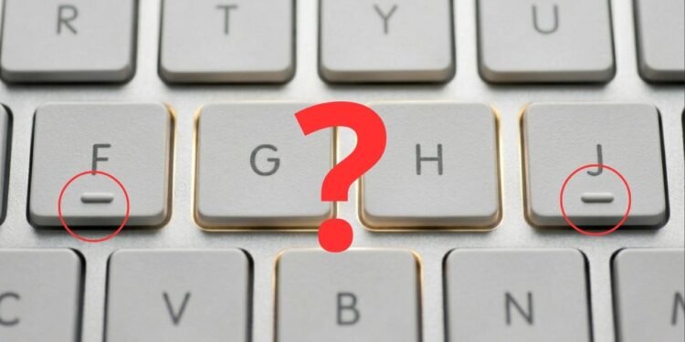 Qual a função da linha abaixo das letras F e J e do número 5 no seu teclado?