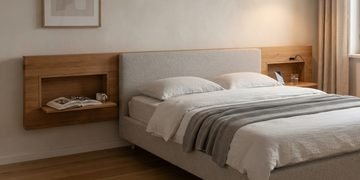 Poucos centímetros atrás da cama podem virar apoio lateral e espaço de armazenamento ao mesmo tempo